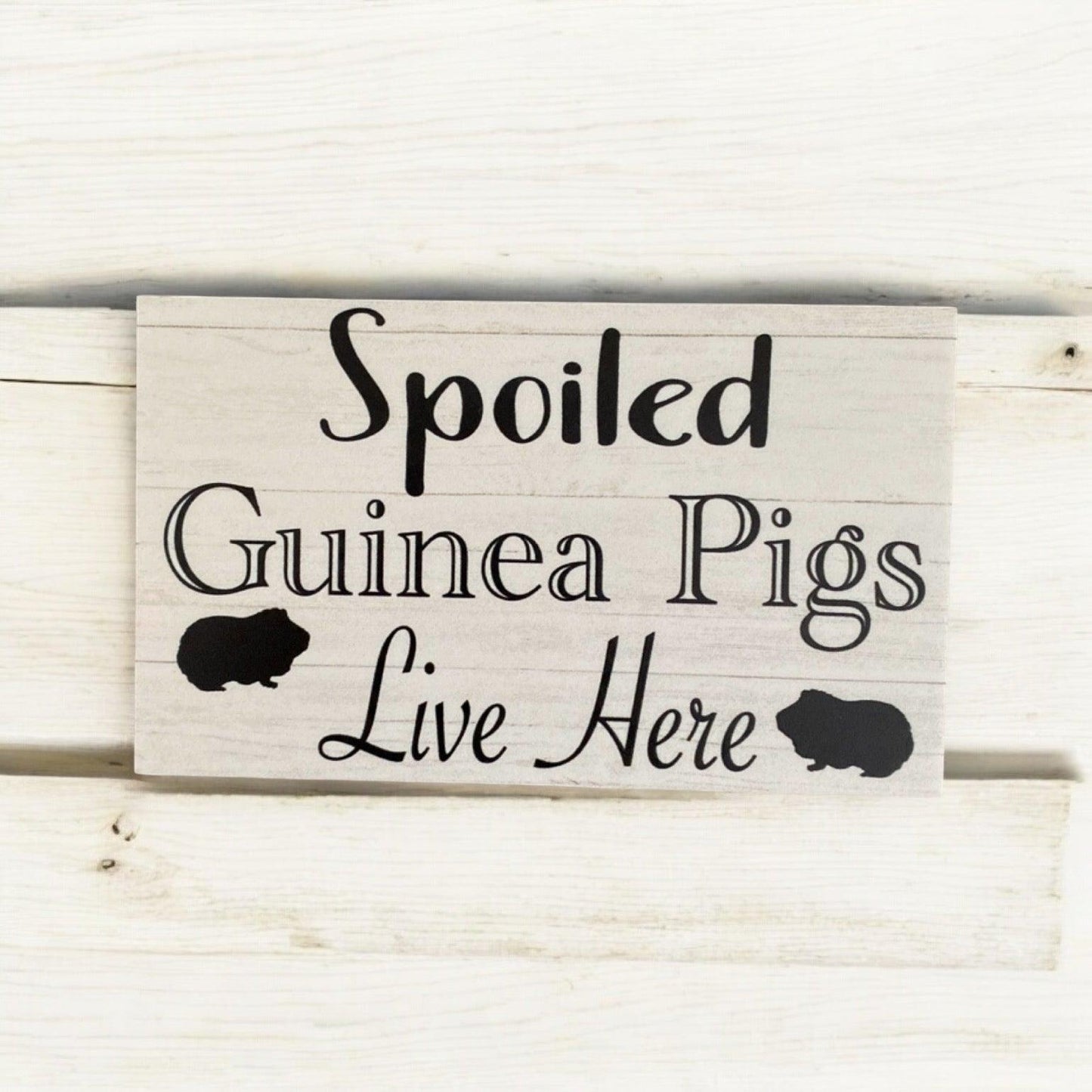 Spoiled Guinea Pigs Live Here Sign