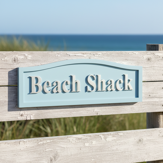 Wooden sign with 'Beach Shack' text on a white background with an Australian flag.