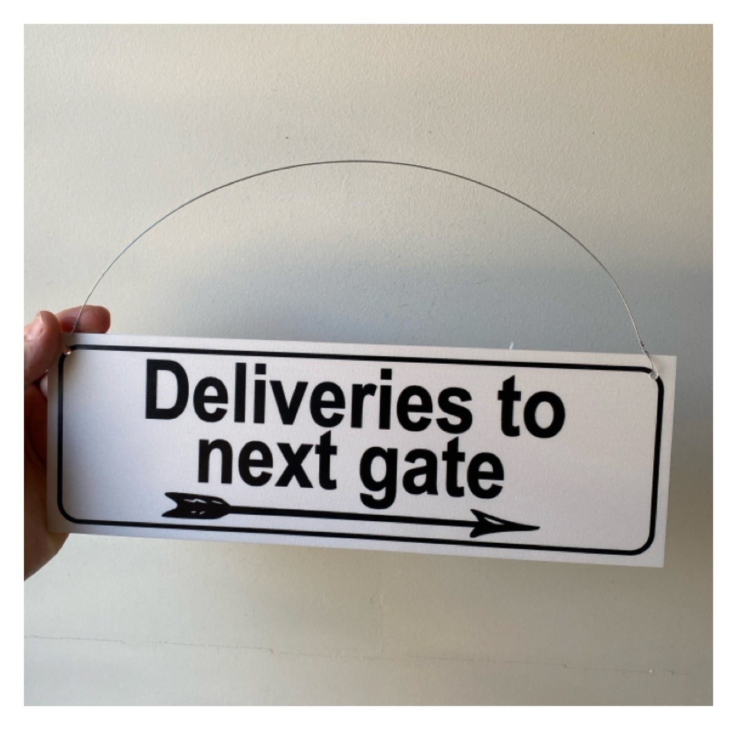 Deliveries To Next Gate Delivery with Arrow Sign