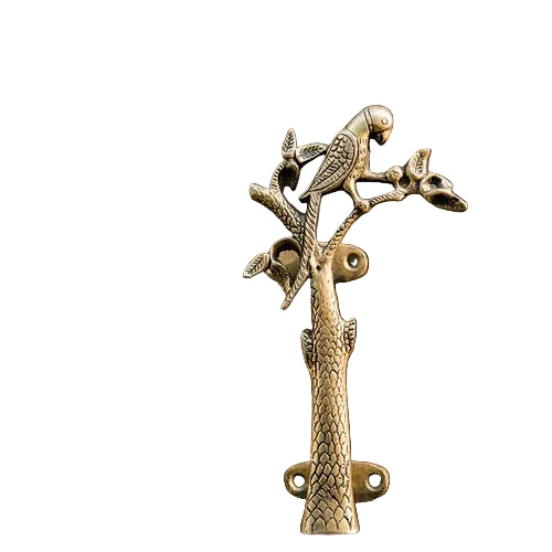 An ornate brass door knocker shaped like a parrot perched on a tree branch, mounted on a dark brown wooden door.