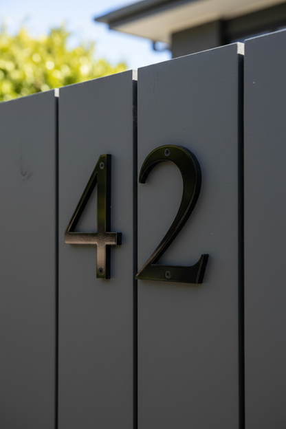 Black 42 on charcoal fence