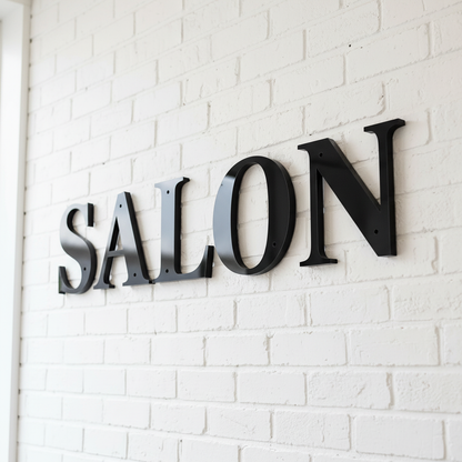 Black SALON letters on salon wall