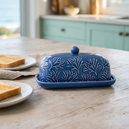 Blue botanical butter dish in a coastal kitchen