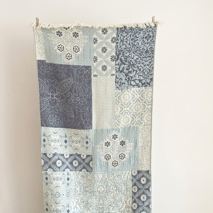 Blue patchwork towel background edit
