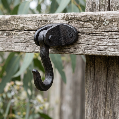 Cast iron hook on a rustic garden shed