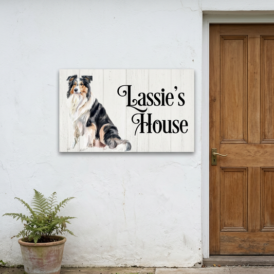 Collie Lassie’s House plaque beside a cottage front door
