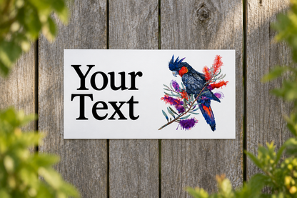 Custom Black Cockatoo sign on a weathered timber fence