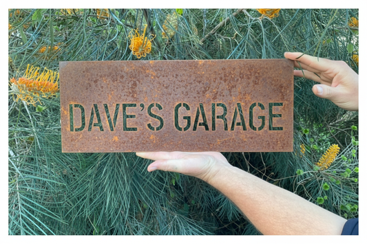 Dave's Garage sign