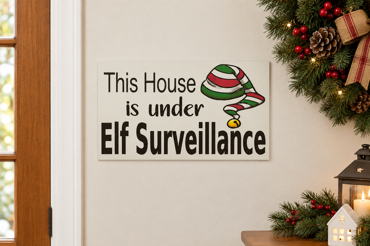 Elf Surveillance sign in a Christmas entryway