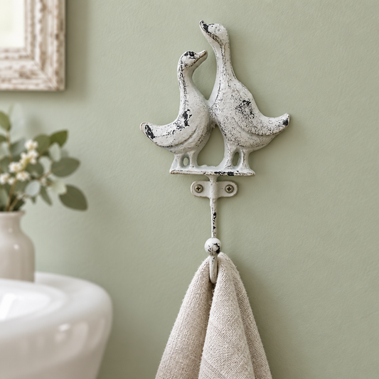 French White duck hook holding a bathroom hand towel