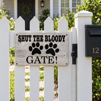 Front picket fence gate near letterbox