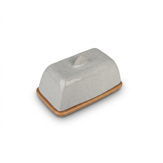 Grey speckled ceramic butter dish on white