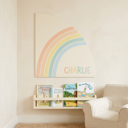 Half-arch panel with a nursery rainbow and name