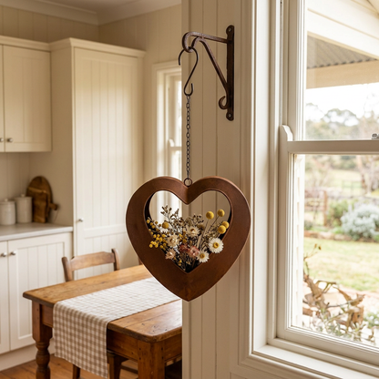 Heart planter hanging beside a farmhouse kitchen window