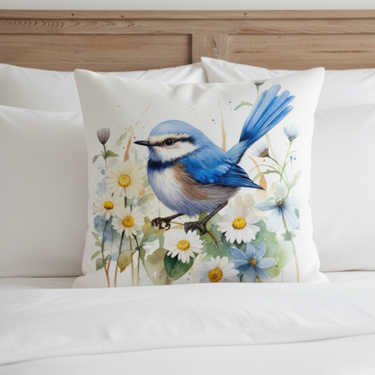 Blue wren cushion propped on white bed linen in a country bedroom — 45x45cm watercolour bird cushion cover