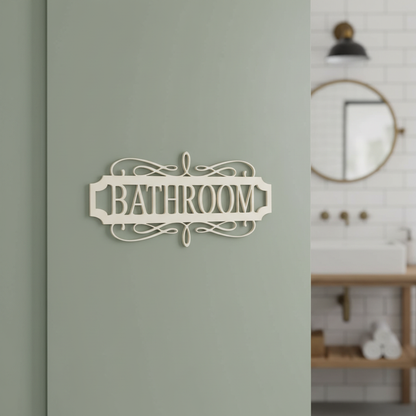 Bathroom — soft ivory painted MDF vintage scroll sign on a flat sage-green surface — painted DIY bathroom door décor