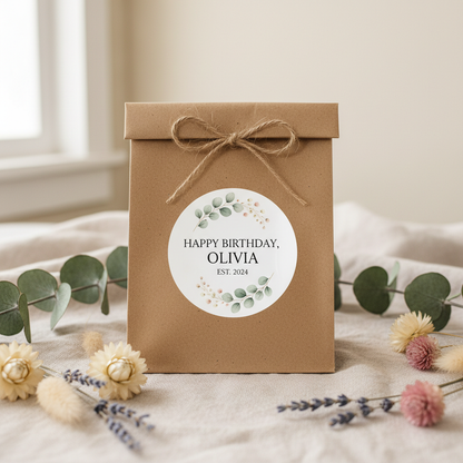 Farmhouse birthday sticker on kraft party favour bag with eucalyptus and dried flowers — personalised birthday party stickers and party bag labels Australia