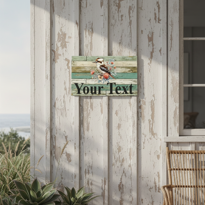 Kookaburra Your Text weathered timber sign on a weathered beach house porch wall