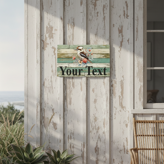 Kookaburra Your Text weathered timber sign on a weathered beach house porch wall