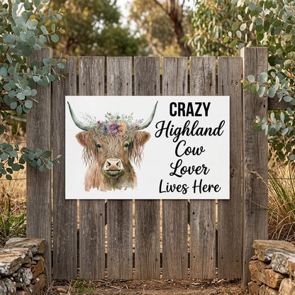 Large Highland cow sign on a country garden gate