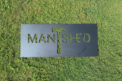 Man Shed sign with hammer