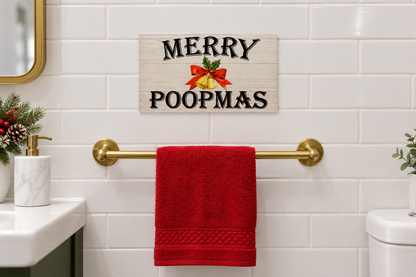 Merry Poopmas sign above a red towel