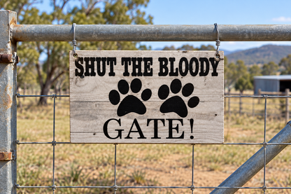 Metal farm gate, hanging with wire