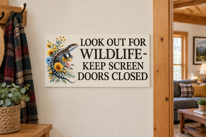 Mounted indoors on wall beside doorway