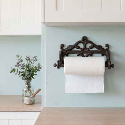 Paper towel holder in a coastal beach-house kitchen with seafoam blue and light timber