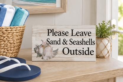 Propped on entryway table with beach towels