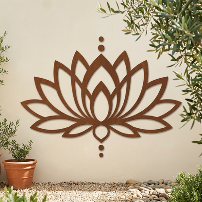 Rusty lotus wall art in a garden courtyard
