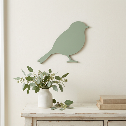 Sage perched songbird used as cottage wall decor