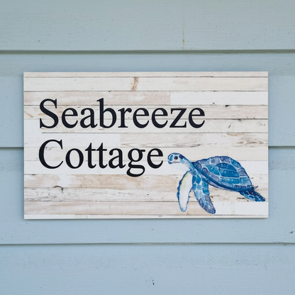 Seabreeze Cottage turtle sign on coastal weatherboards