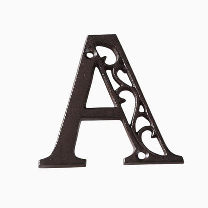The Renmy Store Homewares & Gifts black cast iron letter A with a decorative hollowed-out European retro design.