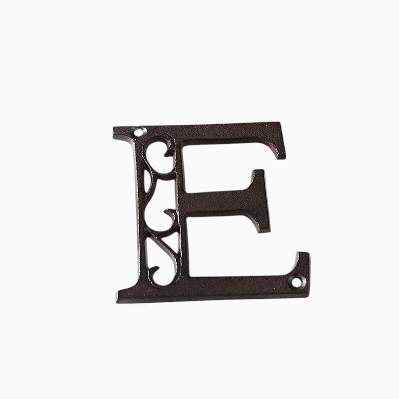 The Renmy Store Homewares & Gifts black cast iron letter E with a decorative hollowed-out European retro design.