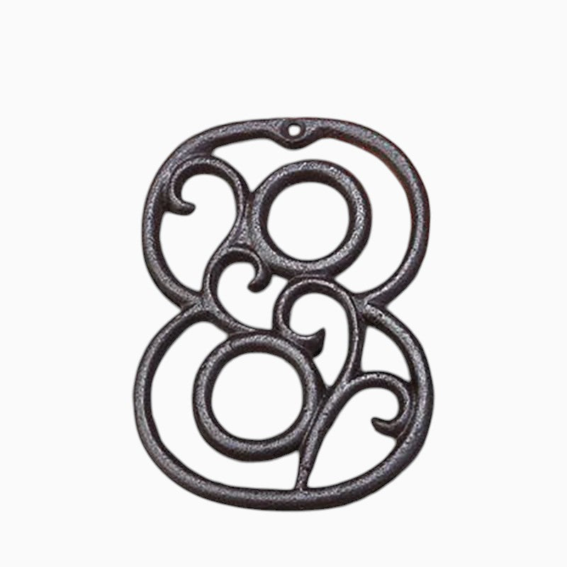 The Renmy Store Homewares & Gifts black lacquered cast iron number 8 with a decorative 3D hollowed-out retro design.