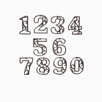 The Renmy Store Homewares & Gifts black cast iron numbers 0-9 with decorative hollowed-out European retro 3D design.