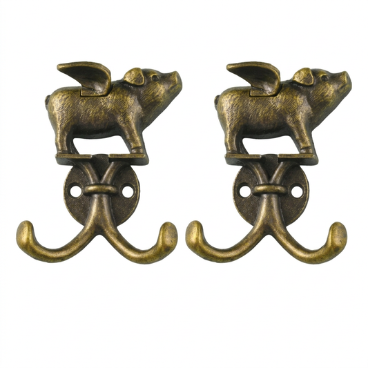 Two flying-pig double wall hooks side by side on a white background