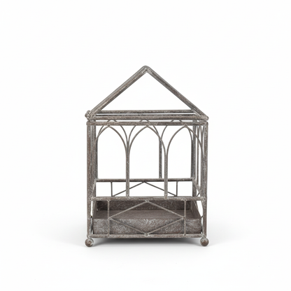 Vintage cathedral terrarium on white