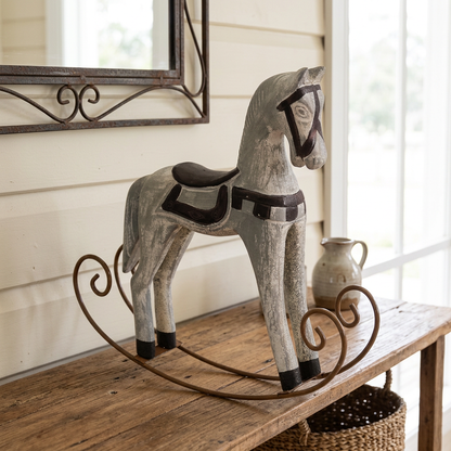 Weathered Grey rocking horse on a farmhouse hallway console