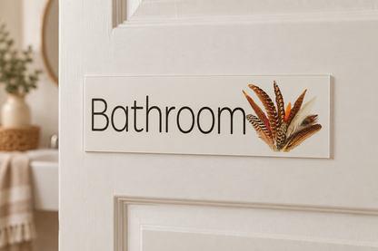 Wild Feathers Bathroom sign on a cottage door